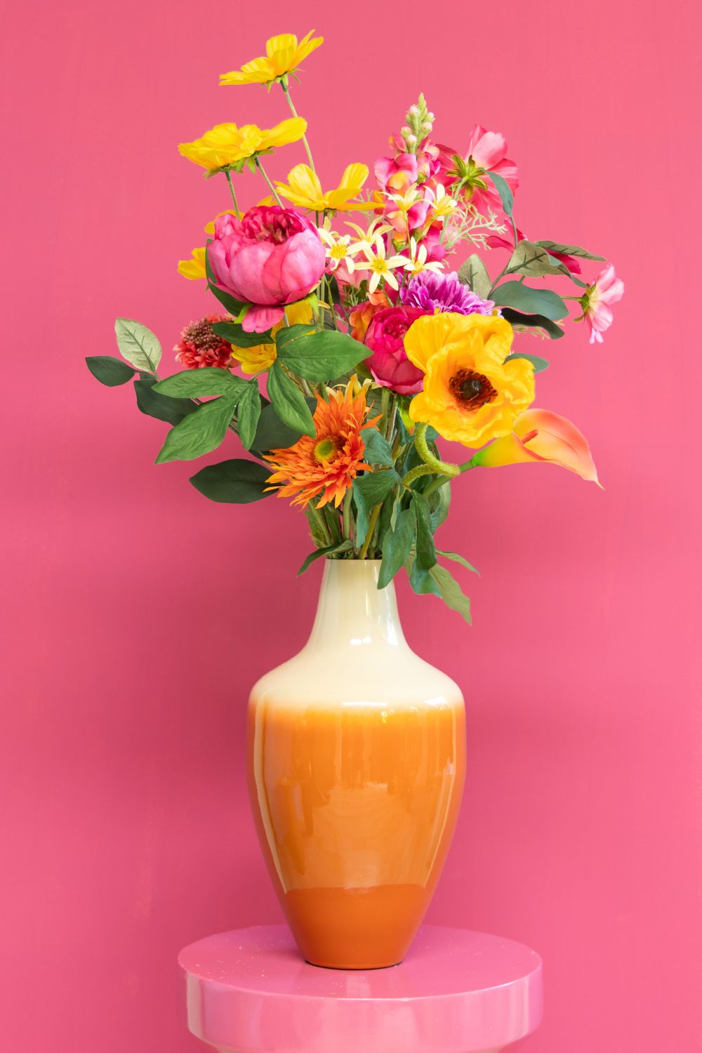 Kunstboeket Sunset Symphony met roze achtergrond